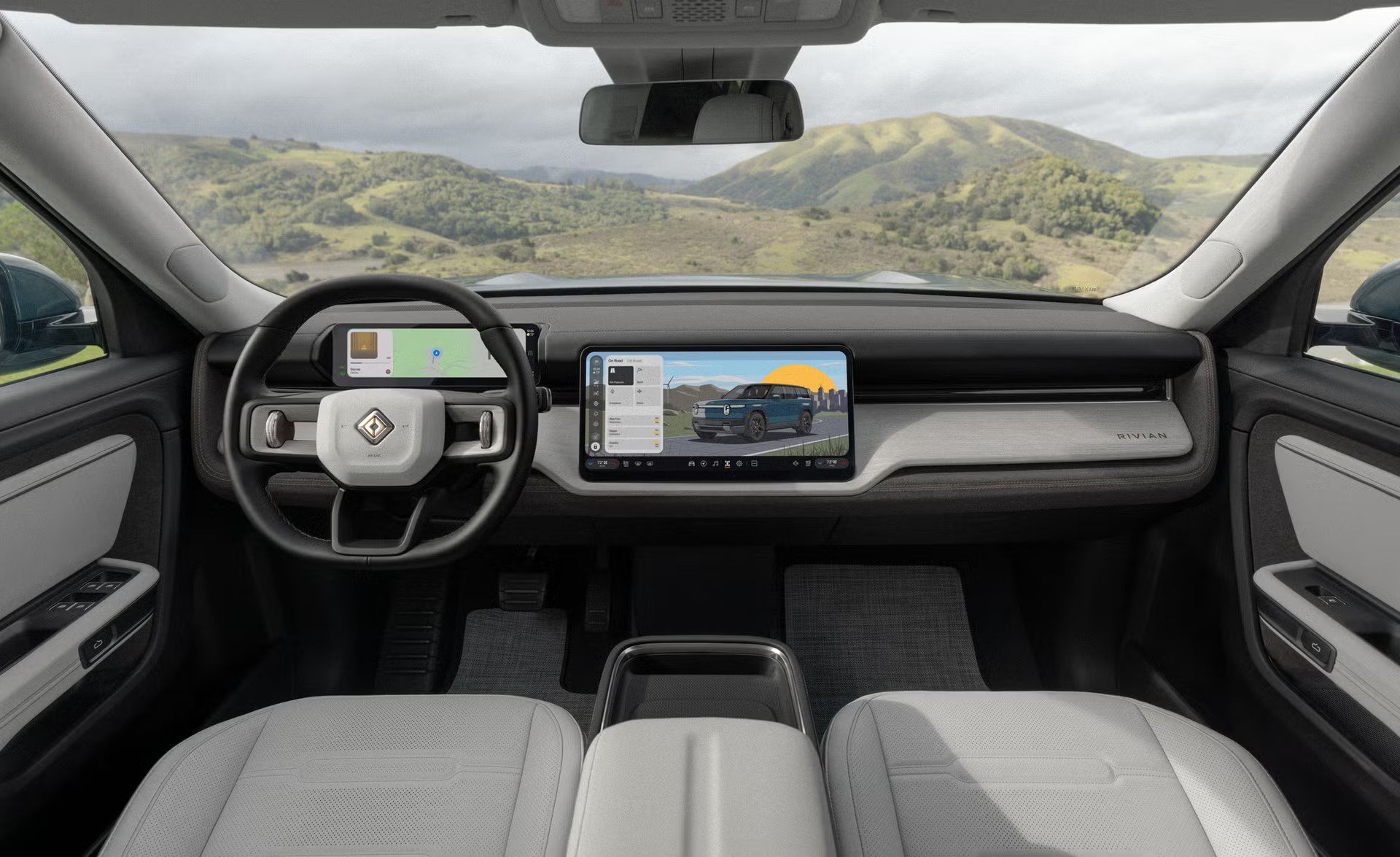 vehicle interior with steering wheel, digital instrument cluster, center touchscreen, light seats.